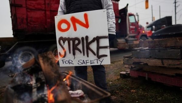 Just Over The Border: More Than 3,000 Canadian National Railway Rail Workers Out On Strike