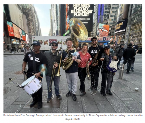 American Federation Of Musicians Member ‘Rally With Live Music’ In Times Square, ‘Fighting To Prevent Artificial Intelligence From Stealing Musicians’ Creativity’